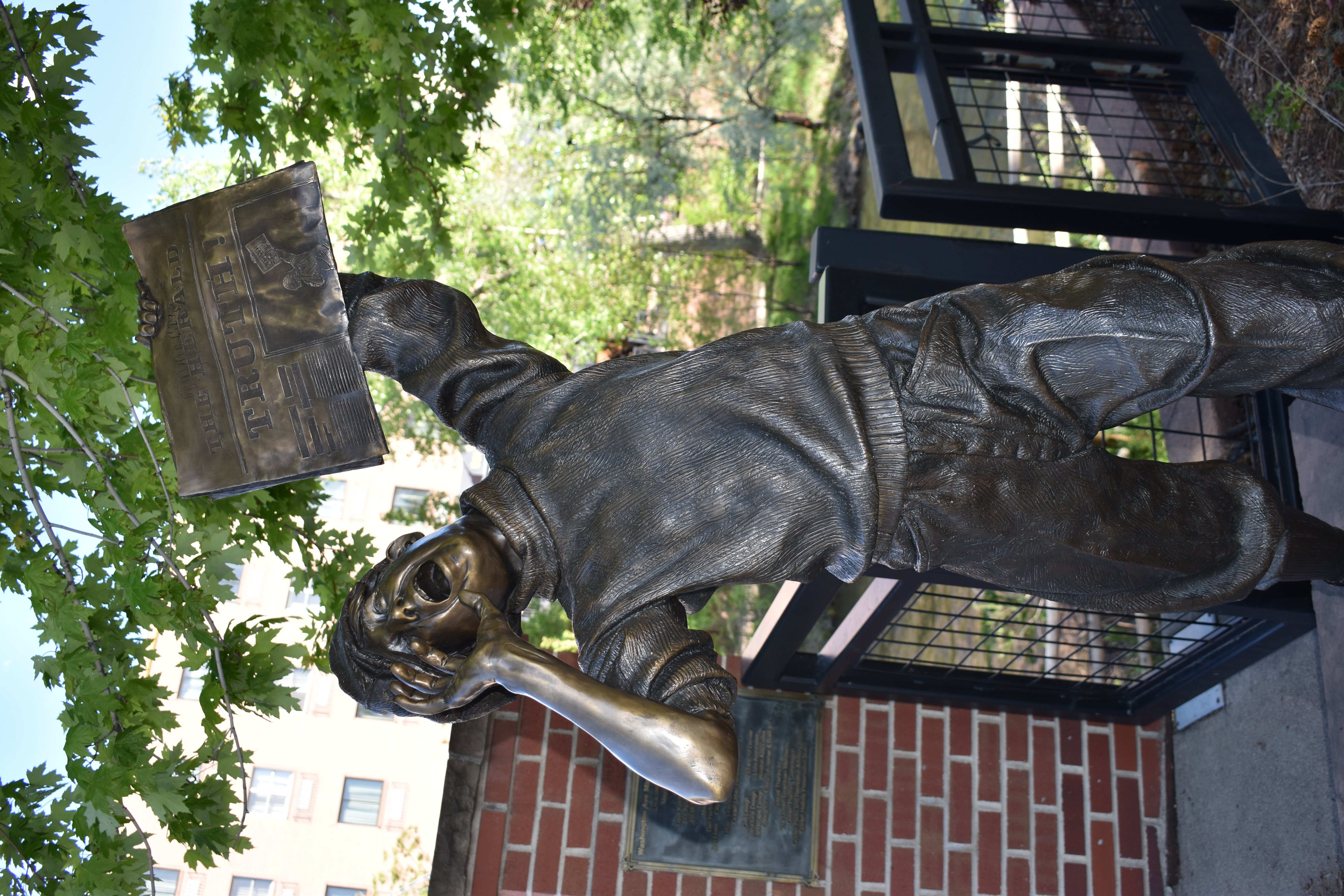 The Newsboy, one of the sculptures along Clear Creek in Golden, welcomes NFPW to Golden as he hawks The Transcript, which was founded in Golden in 1866 and is still published today. Photo by Sandy Michel Nance The Newsboy, one of the sculptures along Clear Creek in Golden, welcomes NFPW to Golden as he hawks The Transcript, which was founded in Golden in 1866 and is still published today. Photo by Sandy Michel Nance